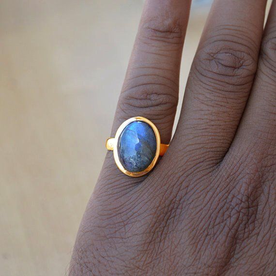 "Blue Fire Labradorite gold ring, 14k yellow gold Labradorite ring, Labradorite Cabochon jewelry,romantic gift ring,gold ring, gift for her Labradorite is known for its qualities of \"magic\" including clairvoyance, psychic powers, telepathy, communication with higher and inner wisdom and guides. Known as a gemstone of adventure, Labradorite is said to help one set off and move swiftly on the inner path and on higher journeys. The 14K yellow solid gold bezel and solid yellow gold ring are both s Gold Rings With Labradorite Gemstone, Gold Labradorite Gemstone Rings, Gold Moonstone Cabochon Open Ring, Yellow Gold Labradorite Ring For Gift, Gold Cabochon Moonstone Open Ring, Gold Labradorite Rings For Anniversary, Gold Open Ring Moonstone Cabochon, Gold Open Moonstone Ring With Cabochon, Gold Moonstone Ring With Bezel Setting For Gift