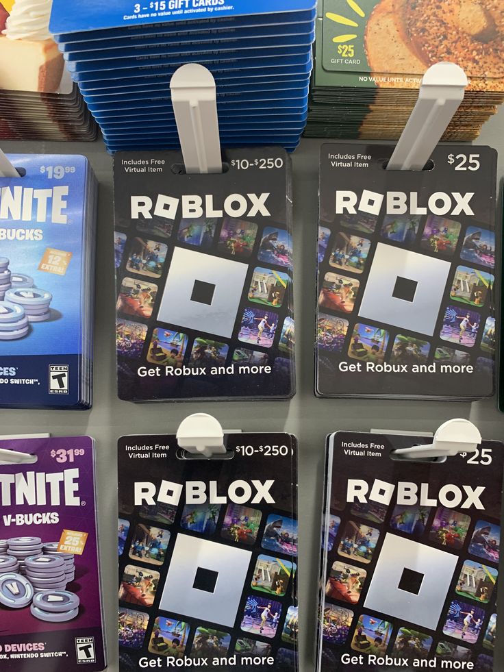 several roblox cards are on display for sale