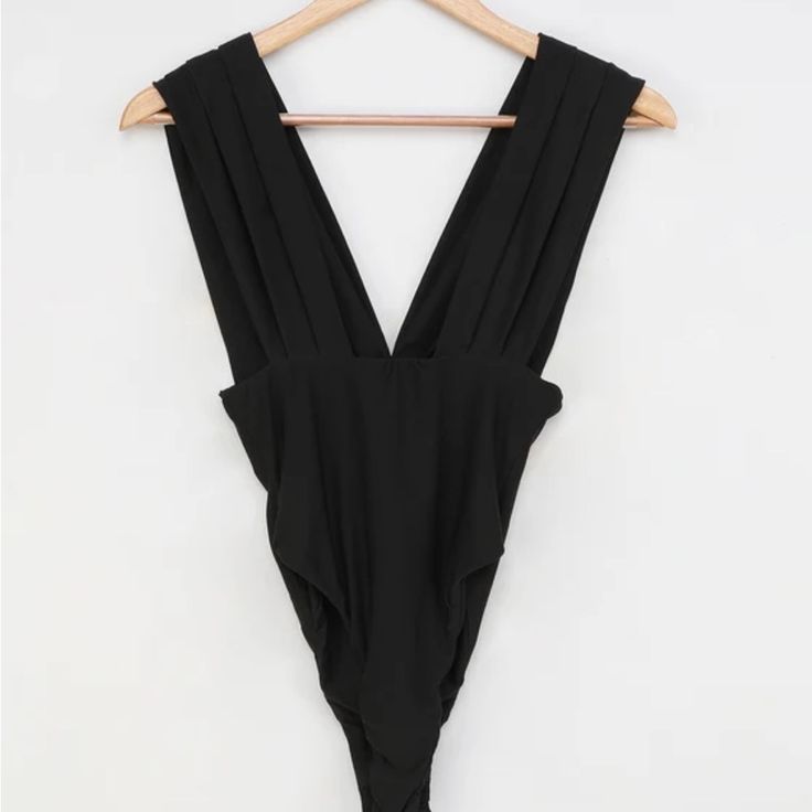 Lulus V-Neck Black Bodysuit Never Worn! “In My Bio Black Sleeveless Bodysuit” Chic Black Sleeveless Bodysuit, Chic Black Low-cut Bodysuit, Black Low-cut Bodysuit, Black Low-cut Bodysuit With Lined Body, Black Sleeveless Bodysuit With Moisture-wicking, Cheap Black V-neck Bodysuit, Black Low-cut Lined Bodysuit, Seamless Elastane V-neck Bodysuit, Black V-neck Bodysuit For Beachwear