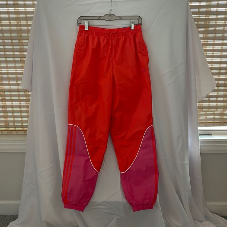 Fun Adidas Trackpants! New With Tags, Never Worn! Trendy Pink Parachute Pants, Sporty Pink Lounge Pants, Sporty Pink Loungewear Pants, Casual Pink Parachute Pants For Spring, Trendy Sports Pants For Spring, Trendy Pink Sweatpants With Elastic Waistband, Trendy Pink Parachute Pants For Spring, Pink Casual Parachute Pants For Summer, Casual Pink Parachute Pants For Summer