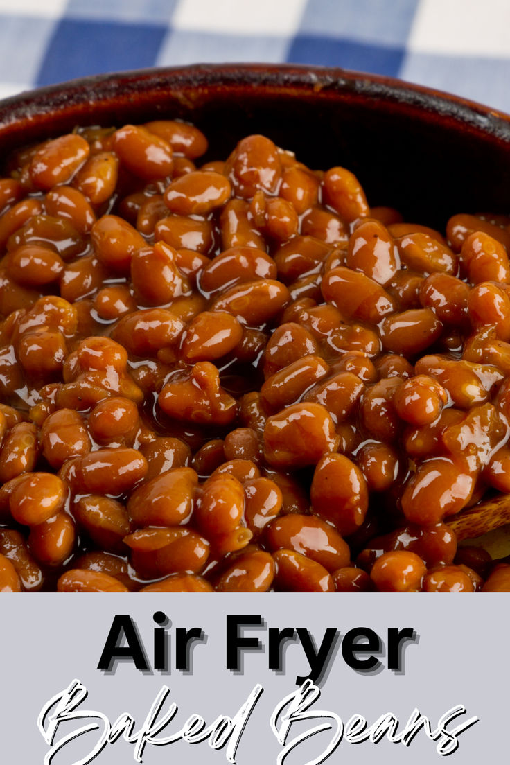 an air fryer baked beans recipe in a skillet on a checkered table cloth