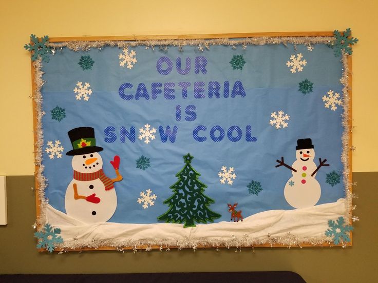 a bulletin board with two snowmen in front of a christmas tree and the words our cafeteria is snow cool