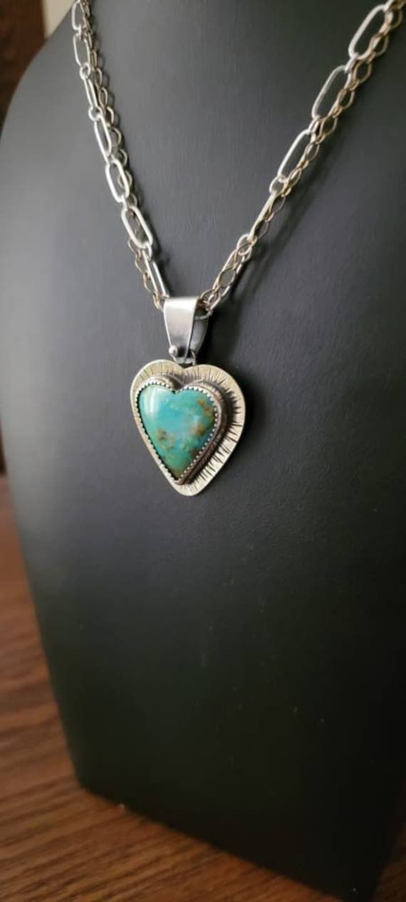 I've used jeweler brass and sterling silver.   The fantastic heart is a gorgeous Sonoran turquoise.  And it is amazing paired with the mixed metals.  I have added both sterling silver chain and brass chain.  This is definitely a great one of a kind piece.  Fantastic statement.  Looks amazing on.  18" length.  See pictures for size reference.  Ready to ship. Turquoise Heart Necklace, Turquoise Heart, Coral Earrings, Western Jewelry, Butterfly Necklace, Leather Wrap Bracelet, Brass Chain, Silver Turquoise, Turquoise Sterling Silver