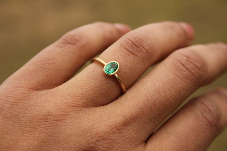 18k Ring With Emerald | Etsy Everyday Minimalist Emerald Ring, Everyday Emerald Ring In Yellow Gold, Elegant Green Emerald Ring For Everyday, Minimalist Emerald Ring For Formal Occasions, Everyday Green Emerald Ring May Birthstone, Minimalist Green Oval Emerald Ring, Minimalist Oval Green Emerald Ring, Everyday Green Emerald Ring With Bezel Setting, Minimalist Green Emerald Wedding Ring