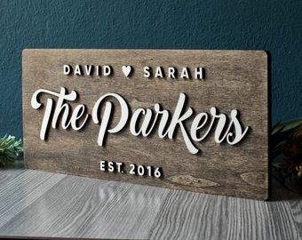 a wooden sign that says, the parkers est 2016