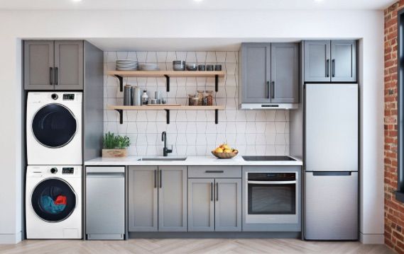 a kitchen with grey cabinets and appliances in front of a blue sign that says help