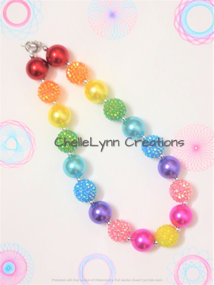 -  Multi color chunky and rhinestone sparkle beads with silver spacers.  20mm beads -  Your little girl or toddler will look like a Princess in this beautiful, fun, Chunky Bubblegum Necklace. -  This necklace would be the perfect dazzling addition for your little Princess outfit to wear for any special occasion. -  Necklace length 17"  Materials:  acrylic beads, resin beads, bead wire, crimp tubes, wire guards, stainless steel clasps **Custom Orders Are Welcome** Ready to ship in 1 to 3 business days by USPS First Class Mail. - Returns & Exchanges I do accept returns and exchanges.  Just mail it back to me within 7 days of delivery. WARNING The jewelry is made with small beads and small parts.   Please do not leave your child unattended while wearing the jewelry.  By purchasing the jewelry Toddler Necklace, Princess Outfit, Girls Necklace, Bead Wire, Bubblegum Necklace, Kawaii Jewelry, Small Beads, Chunky Jewelry, Necklace Craft