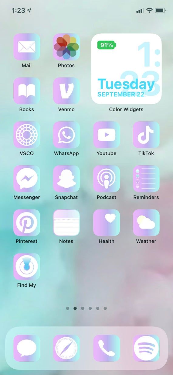 an iphone screen with the text tuesday on it and icons above it in different colors