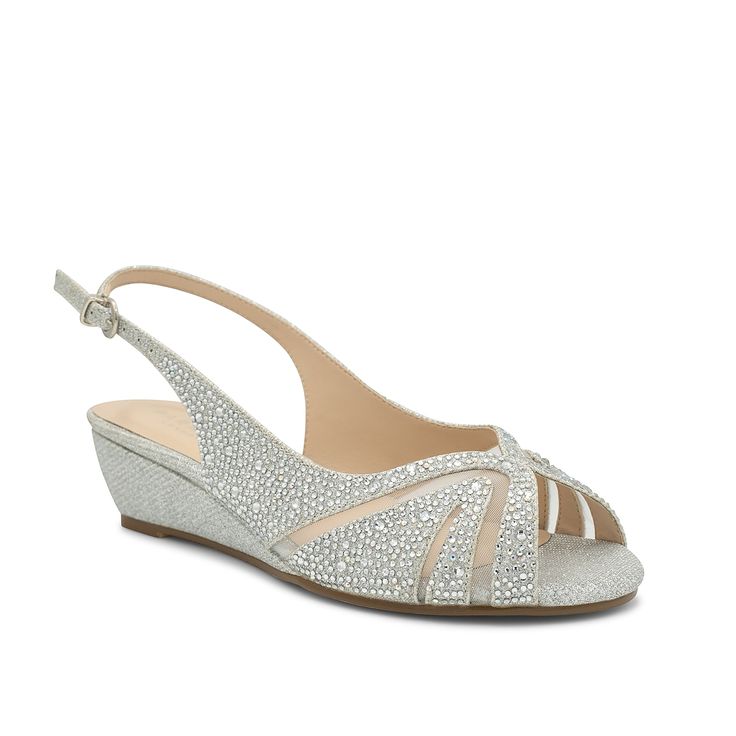 a women's wedged sandal with silver glitter