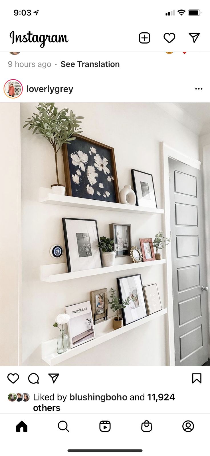 an instagram page with pictures and frames on the wall above it, along with other items