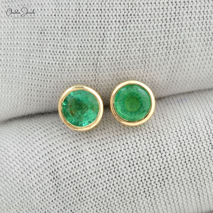 Description Celebrate her elegance with these Real 14k Yellow Gold Bezel Set Emerald Stud Earrings. A timeless gift for mom, these earrings feature vibrant green emeralds in a classic bezel setting, perfect for any occasion. Show your love with this fine jewelry gift. Product Details SKU CJ-E-1187-EM-YG-NP Metal 14K Solid Yellow Gold Closing mechanism Push Back Product dimension 5.88mm x5.89mm x4.33mm Birthstone May Certification - EMERALD DETAILS Size 5mm Quality AAA Pieces 2 Weight 0.94 carats Emerald Stud Earrings, Emerald Earrings Studs, Yellow Gold Earrings, Dainty Studs, Solitaire Studs, Gemstone Stud Earrings, May Birthstone, Birthstone Gifts, Gift Product