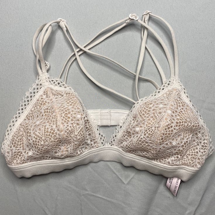 Victoria's Secret White Lace Bralette Basically Brand New Condition Smoke Free Home Open To Offers Spring Bra With Delicate Straps, Feminine White Bra For Spring, Casual White Bra For Summer, Feminine Cream Bra For Spring, Feminine White Bra With Delicate Straps, White Lace Bra With Straps, Spring Cream Bra, White Stretch Lace Bra, Cream Lace Bra For Summer