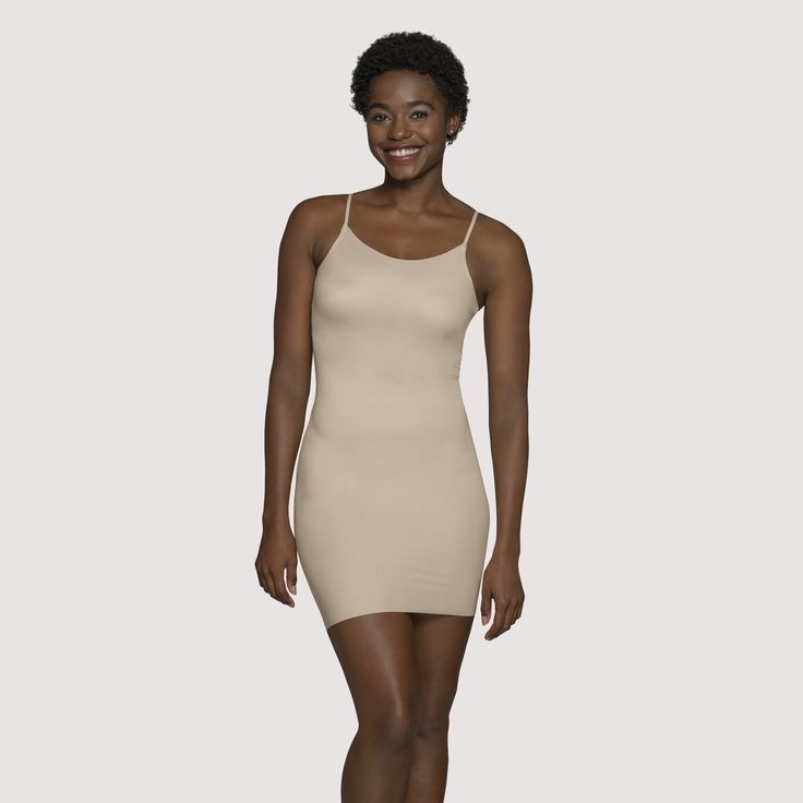 The Vanity Fair® Everyday Layers™ Sleek and Smooth Full Slip features sleek microfiber fabric with lightweight all over smoothing. This full slip molds to your body while being thoughtfully designed to stay in place. The seam-free invisible edges along the neckline and hem provide a no show look under clothes. Back adjustable straps allow you to find your perfect fit. Great for layering under dresses. Solid Smoothing Shapewear For Daywear, Smoothing Shapewear For Daywear, Solid Color Smoothing Shapewear For Daywear, Fitted Smoothing Shapewear For Daywear, Solid Shaping Shapewear For Daywear, Shaping Shapewear For Daywear, Full Coverage Smoothing Camisole, Full Coverage Solid Color Smoothing Camisole, Seamless Fitted Daywear Shapewear