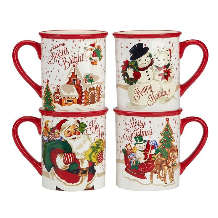 four christmas mugs stacked on top of each other