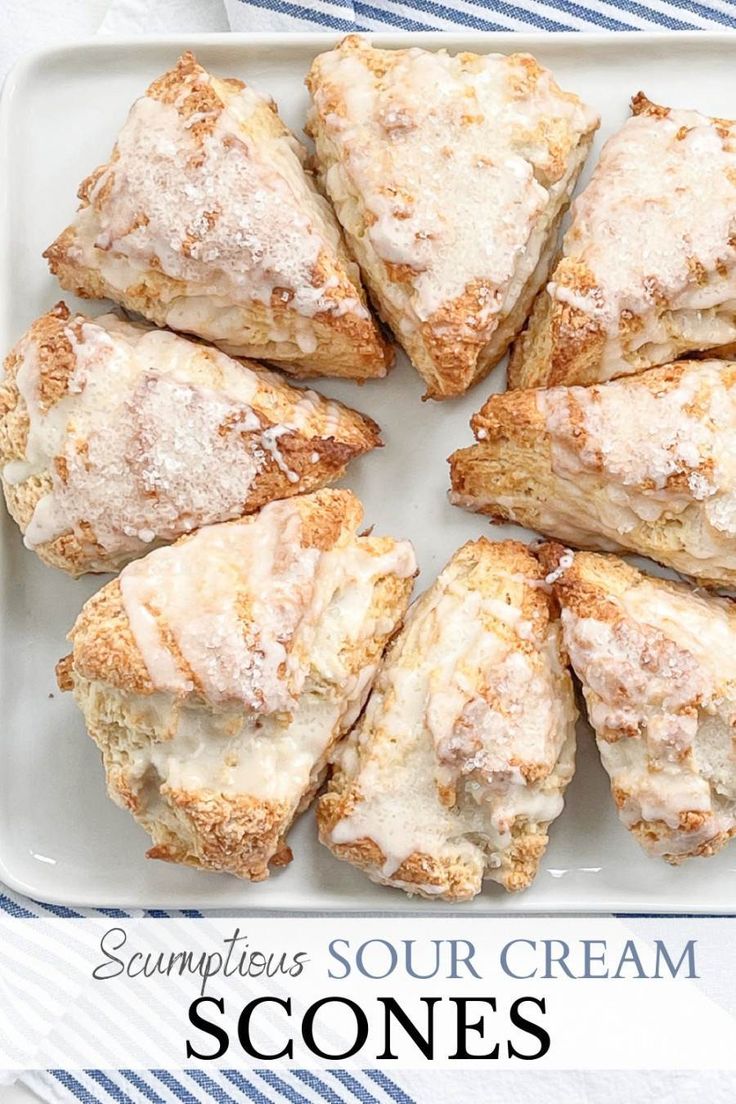 scones with powdered sugar on top and the words scones written below it