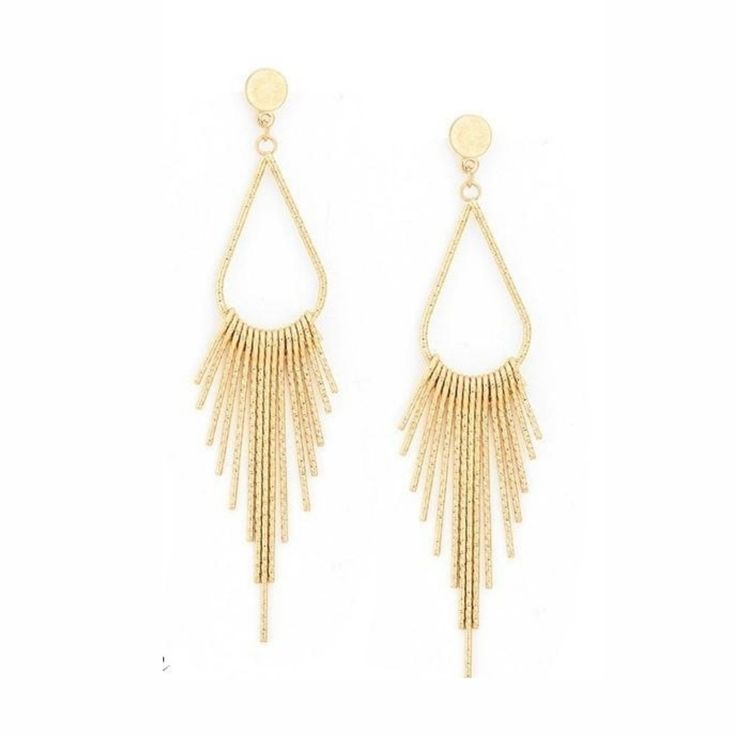 Long Tassel Earrings in Gold or Silver | Hollywood Sensation® Chic Metal Dangle Clip-on Earrings, Elegant Drop Clip-on Earrings With Latkans, Glamorous Dangle Tassel Earrings, Glamorous Dangle Tassel Earrings For Pierced Ears, Elegant Metal Jewelry With Tassels, Metal Tassel Earrings For Party, Elegant Metal Tassel Jewelry, Chic Gold Jewelry With Tassels, Chic Gold Tassel Jewelry