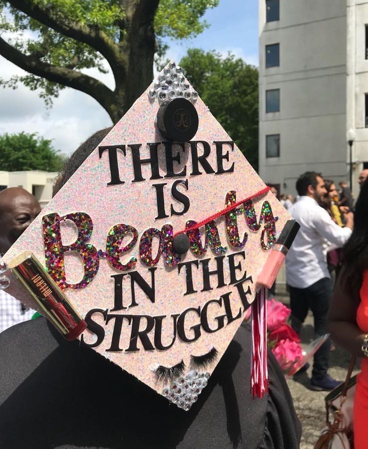 there is a graduation cap that says, there is boomin'in the struggle