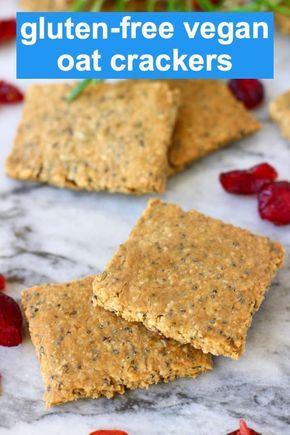 gluten - free vegan oat crackers with strawberries on the side