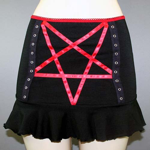 DETAILS Custom-made pentagram mini skirt created using red satin ribbon with black grommet tape on the front and a red elastic waist band. LENGTH: 13" (fits at hip) MODEL: Mannequin has 37" hip VIEW SIZE GUIDE CARE: Hand wash cold, hang dry. SHIPPING: Made When Ordered Please allow 1-2 WEEKS to ship. Red Rock Style Mini Skirt, Rock Style Red Mini Skirt, Red Rock Mini Skirt, Gothic Mini Skirt For Halloween Festival, Gothic Halloween Festival Mini Skirt, Emo Fitted Mini Skirt For Cosplay, Red Mini Skirt For Alternative Fashion, Alternative Fitted Mini Skirt For Festival, Fitted Alternative Mini Skirt For Festivals