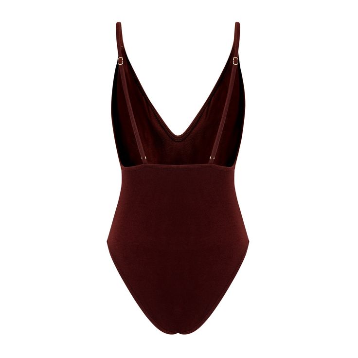 Introducing the "Hamptons" one-piece swimsuit, where elegance meets effortless style. With easily adjustable shoulder straps for a customized fit, and a flattering V neckline and mid-sexy back, this swimsuit offers both comfort and allure. Designed for the ultimate getaway, it provides just the right amount of coverage for confidence and style. Choose between Blush or Maroon in our sexy Italian Terry fabric. Named after the luxurious Hamptons, this swimsuit embodies upscale elegance and stunning Summer One Pieces With Adjustable Straps For Poolside, Summer One-pieces With Adjustable Straps For Poolside, Summer One Piece With Adjustable Straps For Poolside, Summer One-piece Swimsuit With Adjustable Straps For Poolside, Summer Beachwear One-piece With Adjustable Straps, Chic Summer Bodysuit With Moderate Back Coverage, Vacation Sleeveless Bodysuit With Adjustable Straps, Chic Bodysuit With Moderate Back Coverage For Summer, Vacation Bodysuit With Adjustable Straps, Sleeveless