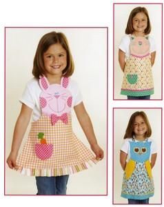 the children's apron and dress pattern is shown