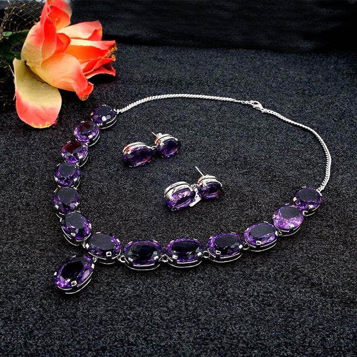 Natural Genuine Amethyst : 318.85 carats Treatment | Cut : None | Oval Adjustable Length : 18 To 20 Inches 100% Natural, Unheated, Non-Treated Amethyst Sterling Silver925 Stone Size : 21.5x14.5mm Silver Weight : 94.20Grams Non-Tarnishable Skin Tested 925 Stamped Provided with GRS Lab Certification Real Time Image. No Tampering Please note all the gemstones we use at RiyaJewels are completely Natural, Unheated And Non-Treated. Riya Jewels Has Set New Standards In Contemporary Silver Jewelry. In Each New Clump, Riya Reaches New Heights Of Inspiration And Individuality. Riya Jewels is a Demi-fine and high end jewellery brand. We thoughtfully handcraft contemporary jewellery designs with clean and simplified geometric designs have it's roots in architectural , organic and contemporary art form Contemporary Art Forms, Contemporary Silver Jewelry, Dark Amethyst, Contemporary Jewelry Design, Silver Necklace Set, Earrings Purple, Halloween 2024, Amethyst Jewelry, Royal Jewelry