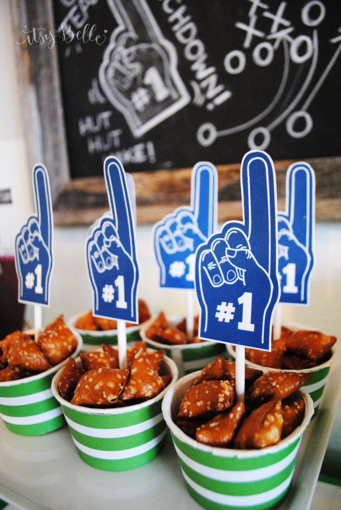 small cups filled with food sitting on top of a table