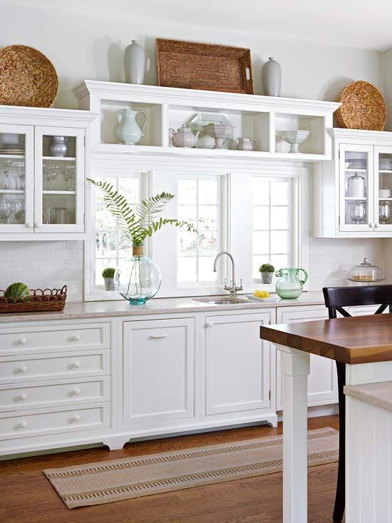 the kitchen is clean and ready to be used as a dining room or living room