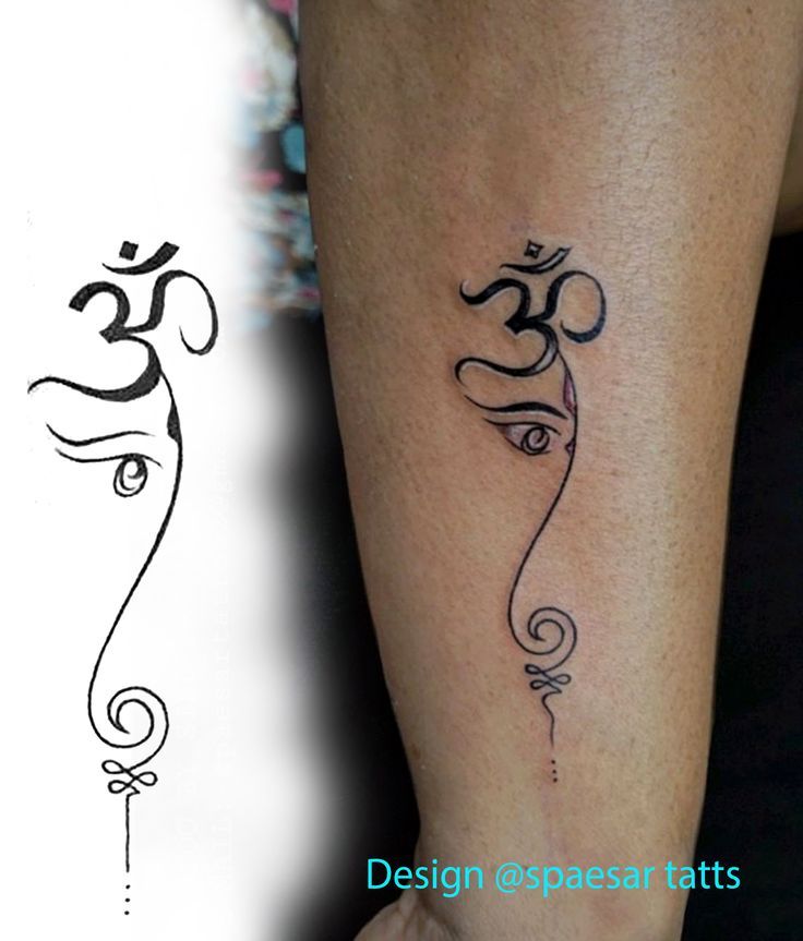 a woman's leg with a tattoo on it and an image of the word om shan