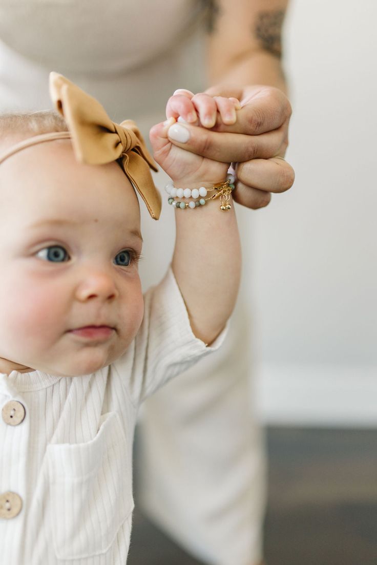 A bright white bead that sparkles like the snow in sunshine. Glacier is the ultimate neutral bracelet. The perfect accessory for every Mom + her mini! Made with the highest quality materials, this bracelet will look beautiful for years to come. Durable enough for play, precious enough to keep forever. Materials: 14k gold filled or sterling silver components. Nickel free. To learn more about our materials and what makes gold filled unique read here. Features: Each bracelet has a ½” extender chain Everyday White Pearl Bracelet With Extender, Adjustable Stretch Bracelet With Pearl Charm For Everyday, Cute White Charm Bracelet For Everyday, Everyday White Pearl Bracelet, Minimalist Hypoallergenic White Charm Bracelet, Cute White Everyday Jewelry, Minimalist Adjustable White Charm Bracelet, White Minimalist Charm Bracelet, Personalized White Pearl Bracelet For Everyday