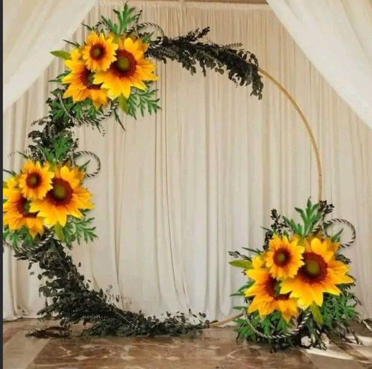 sunflowers are arranged in the shape of a circle on top of a table