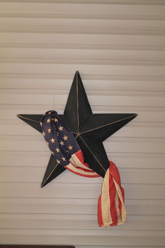 an american flag star hanging on the wall