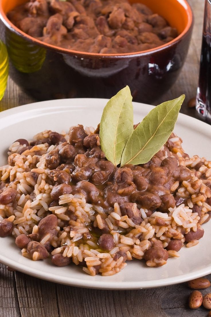 rice and beans are served on a plate