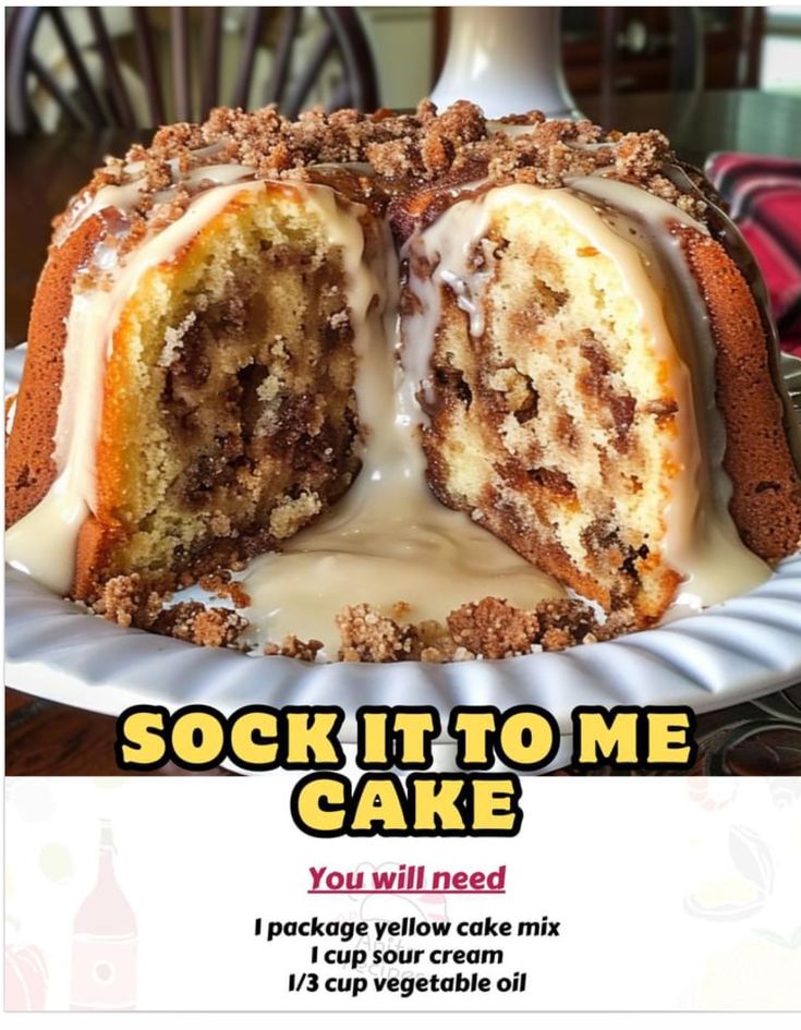 there is a cake on the plate that has been cut in half and it says, sock it to me cake you will need i package yellow cake mix 1 cup sour cream