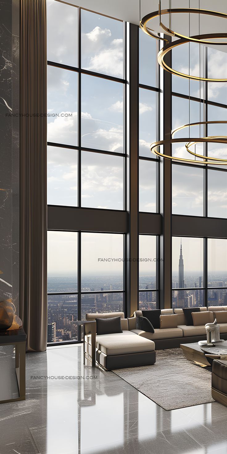 a living room with large windows overlooking the city