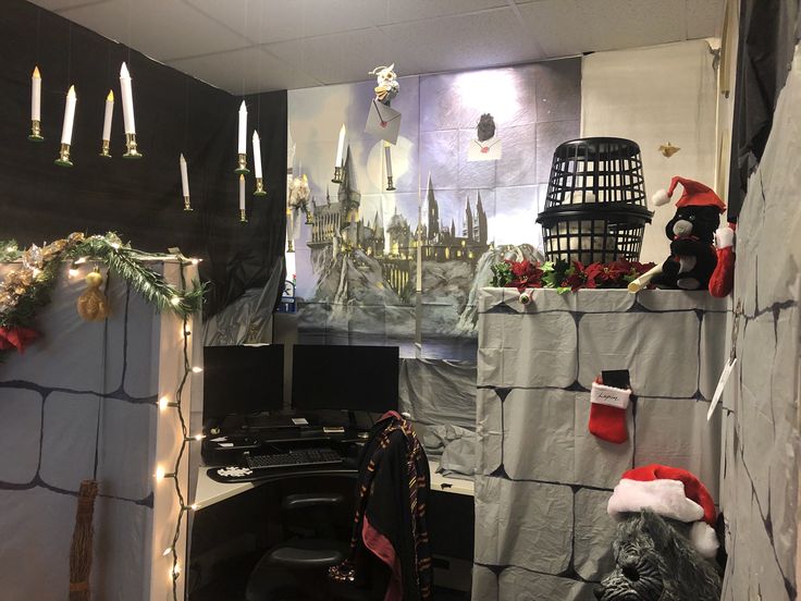 an office decorated for christmas with lights and decorations on the walls, along with other items