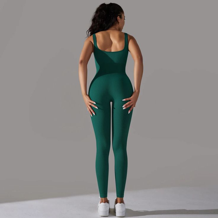 Achieve the perfect balance of style and performance with the Harmony Bodysuit, a premium women's tracksuit designed for the modern athlete. This one-piece yoga jumpsuit is crafted to provide unparalleled comfort and support, making it an essential addition to your activewear collection.✔️Superior Comfort✔️Effortless Style✔️Enhanced Mobility✔️Easy Coordination✔️High-Performance Fabric Sportswear Bodysuit For Training, Green Sleeveless Jumpsuits And Rompers For Yoga, Green Sleeveless Athleisure Jumpsuits And Rompers, Green Sleeveless Jumpsuits And Rompers In Athleisure Style, Green Sleeveless Athleisure Jumpsuit, Green Sleeveless Athleisure Jumpsuit/romper, High Stretch Moisture-wicking Bodysuit For Athleisure, High Stretch Moisture-wicking Athleisure Bodysuit, Compression Athleisure Unitard For Yoga