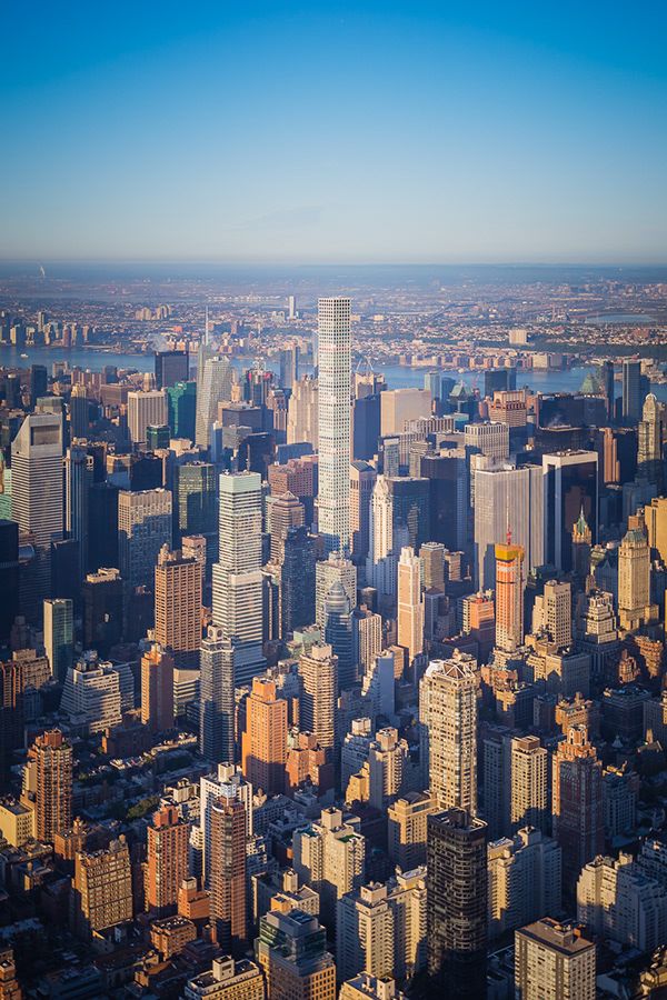 an aerial view of new york city with skyscrapers