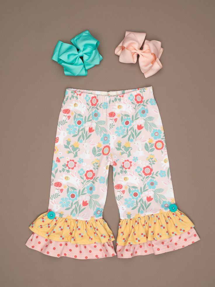 Playful Pink Bloomers For Spring, Cute Pink Pants For Spring, Playful Floral Print Bottoms For Spring, Playful Floral Print Spring Bottoms, Cute Bloomers For Spring Playwear, Cute Bloomers For Playwear, Spring Season, Cute Spring Sets With Elastic Waistband, Cute Spring Bloomers, Cute Cotton Bloomers For Spring