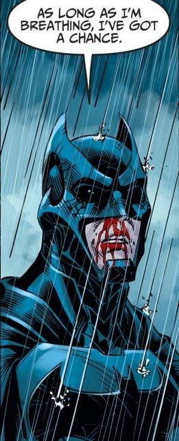 the batman is in the rain with his mouth open