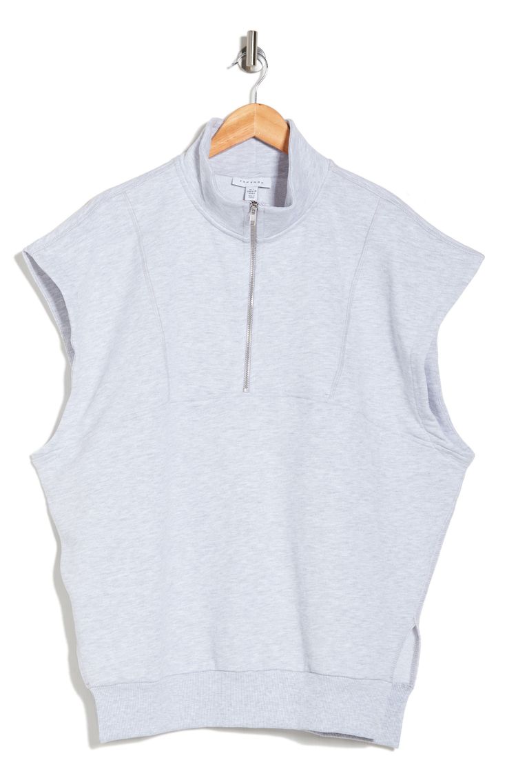 Layer on this sleeveless quarter-zip sweatshirt constructed from soft cotton-blend French terry with a cozy stand collar and vented hem. Quarter-zip closure Stand collar Sleeveless 50% cotton, 50% polyester Machine wash, line dry Made in Turkey Sporty Funnel Neck Top For Spring, Athleisure Top With Funnel Neck And Ribbed Collar, Athleisure Tops With Ribbed Collar For Spring, Spring Athleisure Top With Ribbed Collar, Athleisure Funnel Neck Top With Ribbed Collar, Spring Half-zip Top With Relaxed Fit, Spring Relaxed Fit Half-zip Top, Cotton Athleisure Top With Funnel Neck, Relaxed Fit Half-zip Spring Top