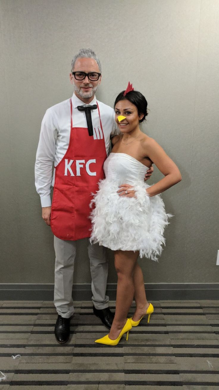 a man and woman dressed up in costumes