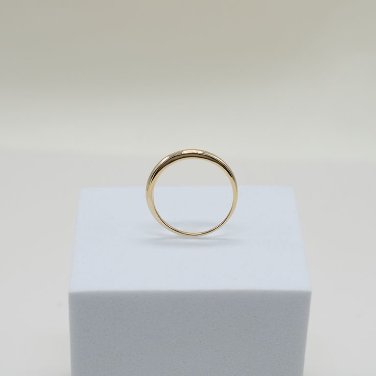 our easy to style Be My Baby Dome Ring will be your new go-to for daily wear. worn alone for a simple, minimal look or stacked together for a chic, layered look, you cannot go wrong with this modern classic. a staple in curating your capsule jewelry collection fine 14k solid gold 1.3 grams 2.5mm thick at top Dainty Tarnish-resistant Dome Ring, Classic Stackable Dome Ring, Classic Stackable 14k Gold Dome Ring, Minimalist Tarnish-resistant Dome Ring, Minimalist 14k Gold Stackable Dome Ring, Baby Dome, Brazilian Gold, Synthetic Diamond, Gold Bond