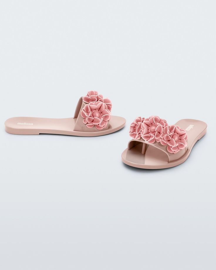 Flowers are forever front and center in the Babe Springtime slides. Romantic flower embellishments top this minimalist poolside style staple, making it that much more special. Plus, a hidden thong under the wide strap keeps things comfortably secure when making a splash. Punk Love, Poolside Style, Punk Movement, Poolside Fashion, Flower Embellishments, Romantic Flowers, Viktor & Rolf, Jelly Shoes, Pink Shoes