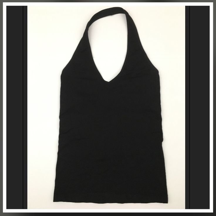 Super Stretchy Black Halter Top. Never Worn Seamless Solid Color Halter Top For Night Out, Seamless Halter Top For Night Out, Black Seamless T-back Tank Top, Fitted Seamless Solid Halter Top, Black Fitted Halter Top With T-back, Black Fitted T-back Halter Top, Black Halter Neck Top For Yoga, Black Stretch Seamless Halter Top, Black Seamless Halter Neck Top