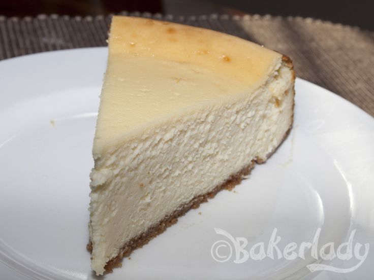 a slice of cheesecake on a white plate