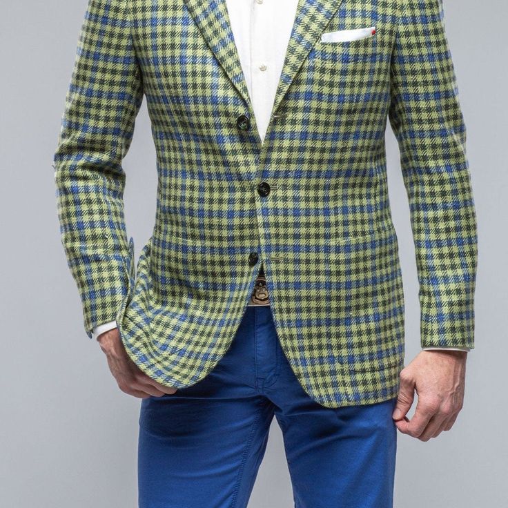 Single-breasted jacket with a check motif, the Hiko is made from soft, exquisite cashmere fabric in shades of green and blue. The deconstructed nature of the garment and the use of soft yarn offer an authentic, personal experience of refined comfort that combines allure and freedom of movement with a focus on relaxed e Luxury Timeless Single-breasted Sport Coat, Luxury Retro Single-breasted Sport Coat, Luxury Tailored Sport Coat With Double-breasted Buttons, Luxury Wool Double-breasted Sport Coat, Luxury Plaid Single-breasted Sport Coat, Travel Jacket, Mac Jeans, Cashmere Fabric, Knit Outerwear