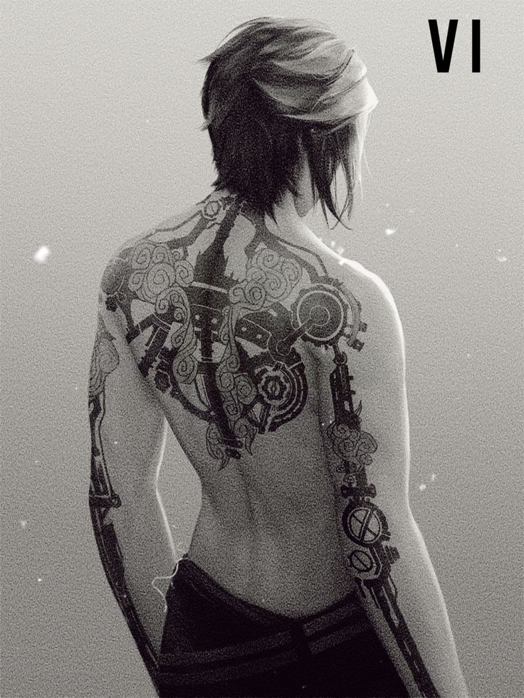 the back of a woman's body with tattoos on it