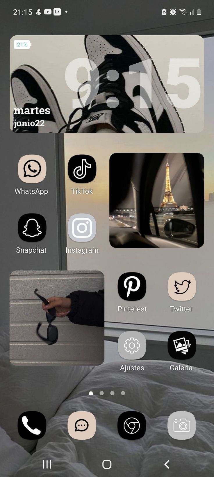 an image of a cell phone with different icons on the screen and in the background