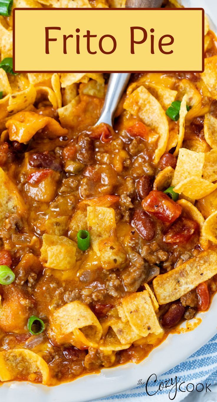 a casserole dish with tortilla chips and meat